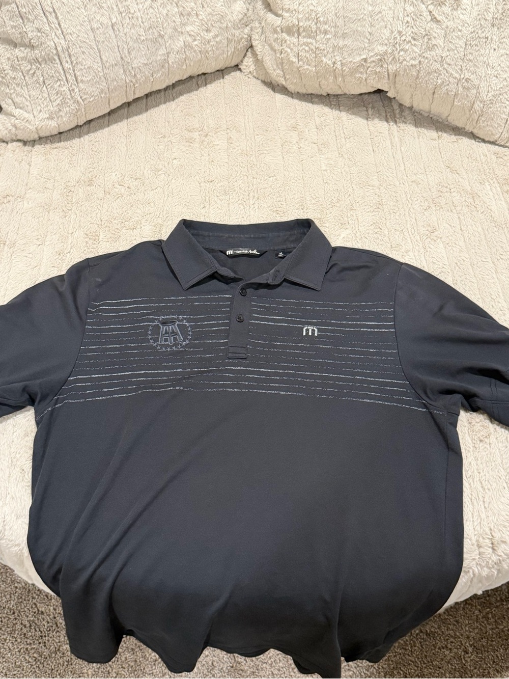 Travis Mathew Men's Navy Polo with Subtle Stripe Detail